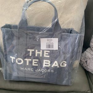 Authentic Brand New Marc Jacobs Medium THE TOTE BAG in the color blue shadow